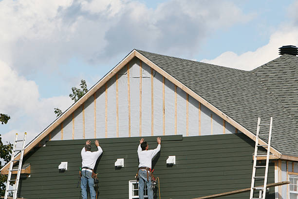 Professional Siding Contractor technician working in Pinehurst, MA